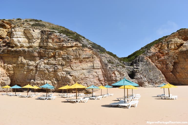 Parasols and loungers in Beliche Beach, Algarve