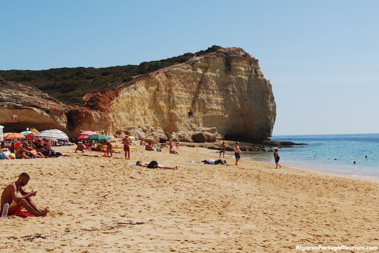Sunbathing in Praia dos Caneiros, Algarve